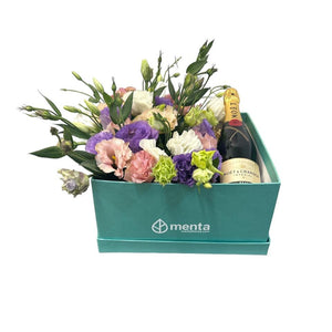 Jade - caja menta con lisianthus rosa,morado y Moet & Chandon Brut
