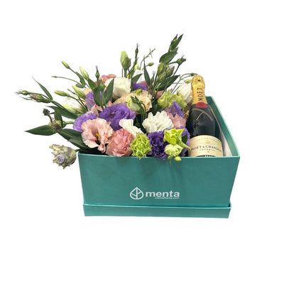Jade - caja menta con lisianthus rosa,morado y Moet & Chandon Brut
