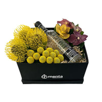 Zafiro-caja negra con leucos, orquídeas vanda y bebida