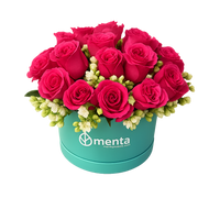 Katy-caja redonda con 24 rosas fiusha y follaje