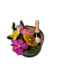 Amatista-caja redonda negra con orquídeas vanda y bebida
