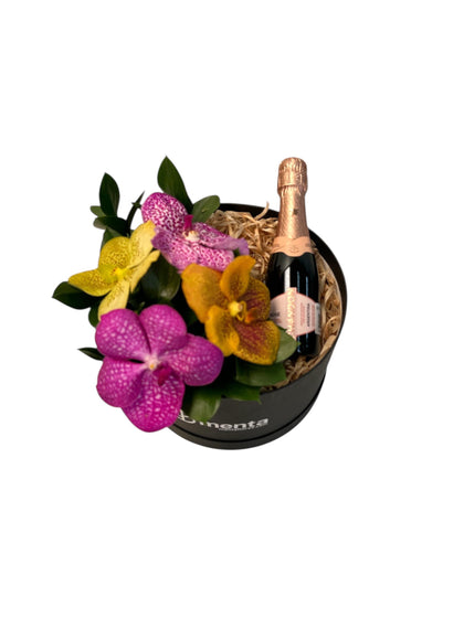 Amatista-caja redonda negra con orquídeas vanda y bebida