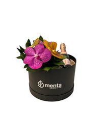 Amatista-caja redonda negra con orquídeas vanda y bebida