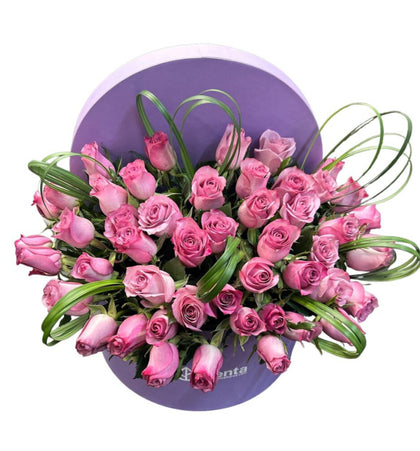 Etiqueta Lila-caja redonda con 48 rosas aqua